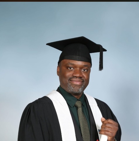 Dr Kennedy Umege